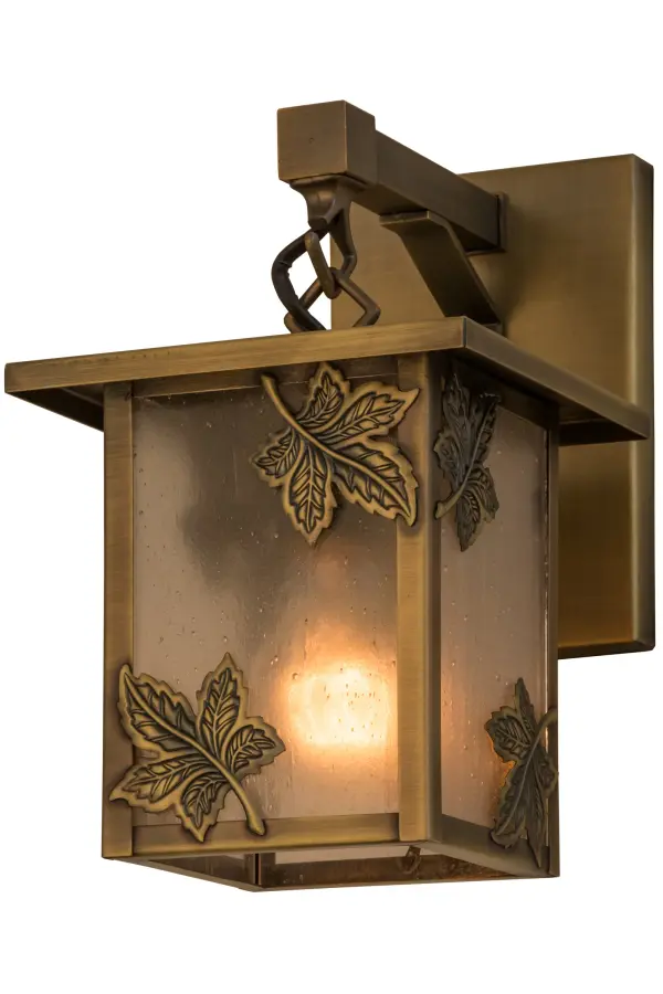 Custom crafted of Solid Brass; this handsome lantern is designed with Clear Seeded glass featuring stunning Maple Leaf accents with matching hardware finished in Antique Brass. One of America's favorite shade and ornamental trees; Maples provide richest colors and represent a loving spirit that sharpen our intuition and strengthen our creativity and health. Perfect for indoor and outdoor applications; the Craftsman Signature fixture is handmade by Meyda artisans in the USA; at the foothills of the Adirondack Mountains. Custom sizes; styles; colors and dimmable energy efficient lamping options are available.