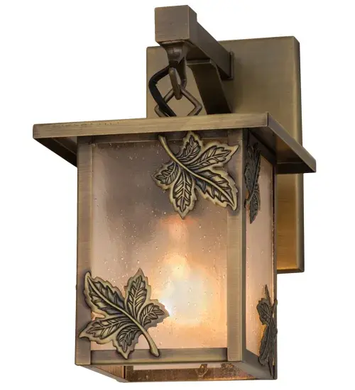 Custom crafted of Solid Brass; this handsome lantern is designed with Clear Seeded glass featuring stunning Maple Leaf accents with matching hardware finished in Antique Brass. One of America's favorite shade and ornamental trees; Maples provide richest colors and represent a loving spirit that sharpen our intuition and strengthen our creativity and health. Perfect for indoor and outdoor applications; the Craftsman Signature fixture is handmade by Meyda artisans in the USA; at the foothills of the Adirondack Mountains. Custom sizes; styles; colors and dimmable energy efficient lamping options are available. - alternate view