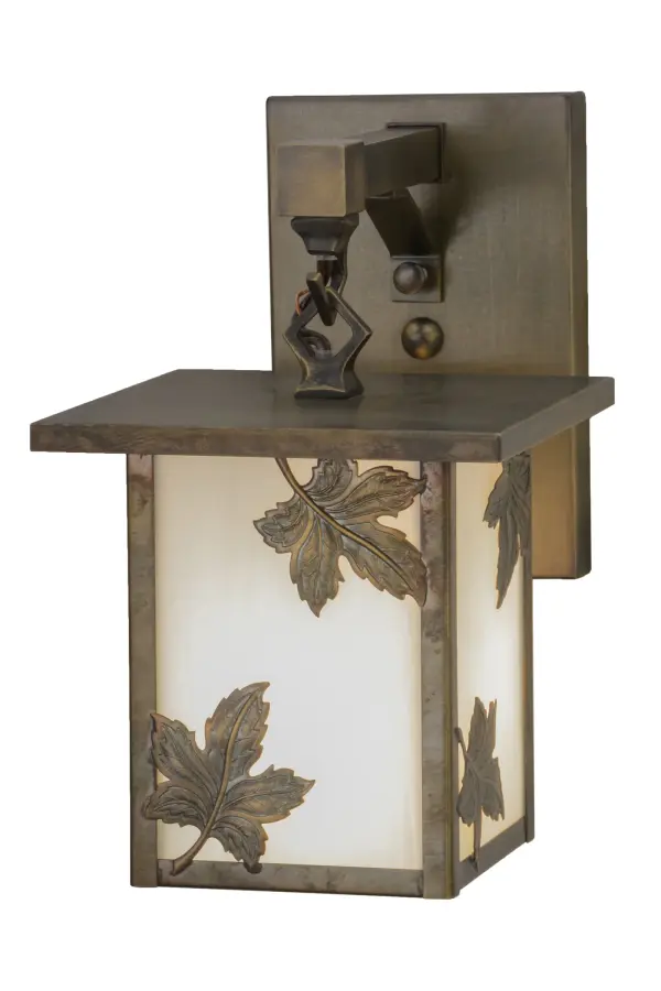 One of America's favorite shade and ornamental trees, Maples provide some of the richest colors and represent a loving spirit that balances male and female energies of sweet promises and aspirations that sharpen our intuition and strengthen our creativity and health. Custom crafted of Solid Brass, this Craftsman Signature lantern is designed with White art glass featuring stunning maple leaf accents finished in Antique Copper. Perfect for indoor and outdoor applications. Handmade by Meyda artisans in the USA, at the foothills of the Adirondack Mountains. Collection: Hyde Park Finish: Antique Brass Glass: White Art Glass Notes: Custom Crafted In Yorkville, New York Please Allow 30 Days Width: 6.50" Height: 10.00" Length: 9.25" Weight: 4.00 lb Extension from Wall: 9.25" Number of Bulbs: 1 Maximum Wattage: 60.00 W Bulb Type: A19 Bulb Base: E26 Material: Brass Country of Origin: USA Safety Listing: Wet Safety Rating: Wet