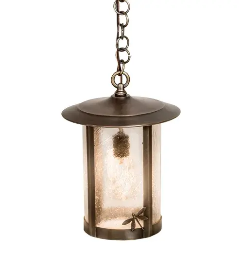 A delicately crafted Dragonfly accents the edge of this handsome Craftsman Signature lantern style pendant. The Solid Brass Pendant; handcrafted at the foothills of the Adirondack Mountains in the USA by highly skilled artisans; is finished in Antique Brass and features Clear Seeded Glass. This fixture is available in custom sizes; colors; and finishes; as well as dimmable energy efficient lamping options such as LED. This ceiling luminaire can be used for both indoor and outdoor lighting applications. The 10-inch wide fixture is UL and cUL listed for dry and wet locations. - alternate view