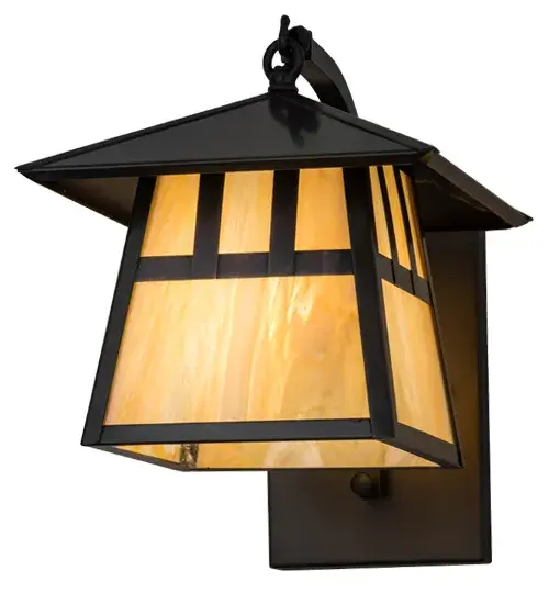 Custom made from Solid Brass. A dramatic Mission-styled straight-line design creates a stunning Craftsman design statement. It is highlighted with a Beige Iridescent Glass shade and a curved arm and hardware featured in a Craftsman Brown finish. This handsome wall sconce is constructed for interior and exterior applications. It can be mounted to walls while providing beautiful ambient lighting in timber homes, modern farmhouses, and other spaces from Traverse City, Michigan, to Lake Tahoe, Nevada, to Lake Geneva, Wisconsin. The Stillwater Double Bar Mission Curved Arm Hanging Wall Sconce is included in our American-made, American-designed, handcrafted Craftsman Signature Series and manufactured in Yorkville, New York. UL and cUL listed for dry, damp, and wet locations. Our Build Your Own Craftsman Signature Series features unlimited combinations of styles, functions, sizes, and finishes. Options include lanterns, pier and post mounts, and deck lights crafted of marine-grade materials like brass and copper with timeless living finishes offered to endure harsh climates. Collection: Stillwater Finish: Craftsman Brown Glass: Beige Iridescent Glass Width: 8.00" Height: 10.00" Length: 12.00" Weight: 4.00 lb Extension from Wall: 12.00" Number of Bulbs: 1 Maximum Wattage: 60.00 W Bulb Type: A19 Bulb Base: E26 Country of Origin: USA Safety Listing: Damp Safety Rating: Wet - alternate view