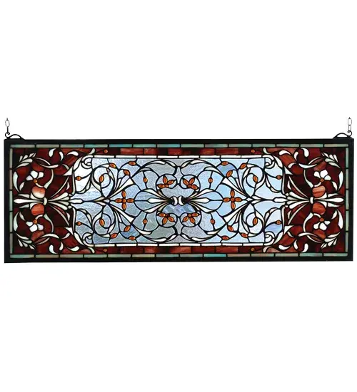 A Pomegranate Red border is centered over a Frosty Blue field with flowers and flourishes of Wispy White and Amber jewels. This Meyda Tiffany classic transom window is created of 512 hand cut pieces of stained art glass. The solid frame is made of the same brass as the hanging bracket and chains that are included with this window.