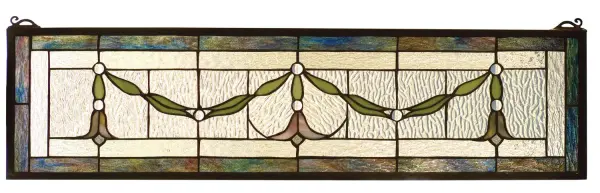 A Multi Hued border and garland borders accent the rippling textured Clear glass of this elegant Victorian inspired stained glass window. The window is handcrafted utilizing the copperfoil construction process and 86 pieces of stained art glass encased in a solid brass frame. Mounting bracket and chain are included. Collection: Garland Swag Finish: Zar Pbag Kalt Clear Glass: Zar Pbag Kalt Clear Width: 32.00" Height: 8.00" Length: 32.00" Weight: 3.00 lb Bulb Type: TBD Material: Metal Or Polyresin Country of Origin: CHINA Safety Listing: Dry Safety Rating: Dry