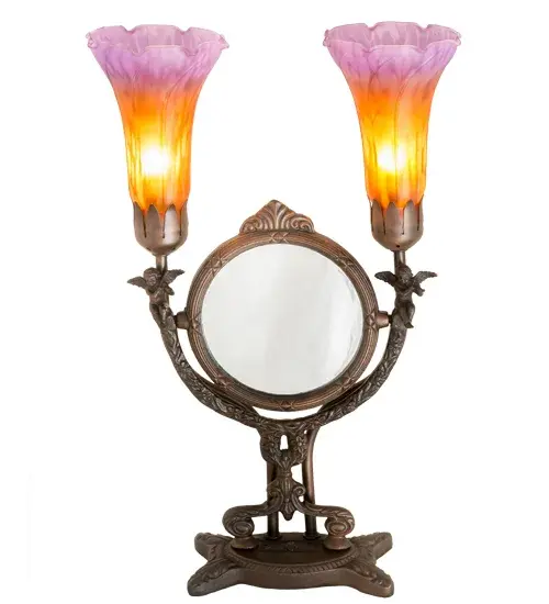 Inspired by the famous Tiffany design from the early 1900s. This accent lamp features two stunning Amber and Purple art glass shades that are embraced by an elegant cast base featuring two small Cherubs and a Mirror finished by hand in Mahogany Bronze. The Pond Lily Twin Cherub Mirror Accent lamp is included in our American designed; handcrafted Favrile Glass Lighting Collection. UL and cUL listed for dry locations. Each shade is a unique work of art with color variations based on natural ingredients inherent in the glass. Contact us if color matching is critical when ordering multiple items. - alternate view