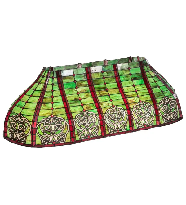 Inspired by Celtic Vines and Floral artwork; this oblong shade features Celtic Knot stained glass medallions on a Green and Burgundy background. The shade is ideal for use with hardware to create the matching Oblong Pendants; Model 189820 and 98639; making a design statement above bars; billiard rooms; kitchen islands; and tables in residential and hospitality settings. The Celtic Knot Oblong Shade is featured in the American-designed; handcrafted Celtic Lighting Collection. Each shade is a unique work of art; with color variations based on natural ingredients inherent in the glass.