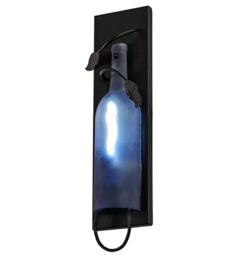 Capture the life of the party with the whimsical design of the Meyda Wine Bottle wall sconce. Liven up a restaurant, club, or home with a wall fixture that does so much more than deliver light, it adds personality and pizzazz. A Blue Glass Wine Bottle is embraced by a Black finished wall plate with a Vine-like metal accent. Create a stunning design statement by installing this ADA-compliant wall fixture in corridors and dining areas in homes, restaurants, hotels, pubs, nightclubs, and wineries, connoisseurs will appreciate this luminaire's fine detail and charm. This rich-looking Tuscan Vineyard Wine Bottle Wall Sconce is included in our American-made, American-designed, handcrafted Wine Bottle Lighting Collection. The fixture is manufactured in Yorkville, New York. UL and cUL listed for dry and damp locations. Take your finest bottle of wine, and Meyda will transform it into an everlasting personalized fixture of light. Contact us for more information on custom wine bottle lighting fixtures and lamps. We can also create custom lighting with beer bottles, mason jars, milk bottles, and other glass containers and vessels. Collection: Tuscan Vineyard Finish: Textured Black Glass: Blue Sandblasted Notes: Custom Crafted In Yorkville, New York Please Allow 50 Days Width: 4.00" Height: 16.00" Length: 2.50" Weight: 2.00 lb Extension from Wall: 2.50" Number of Bulbs: 1 Maximum Wattage: 40.00 W Bulb Type: T6.5 Bulb Base: E17 Material: Steel Country of Origin: USA Safety Listing: Dry Safety Rating: Damp - alternate view