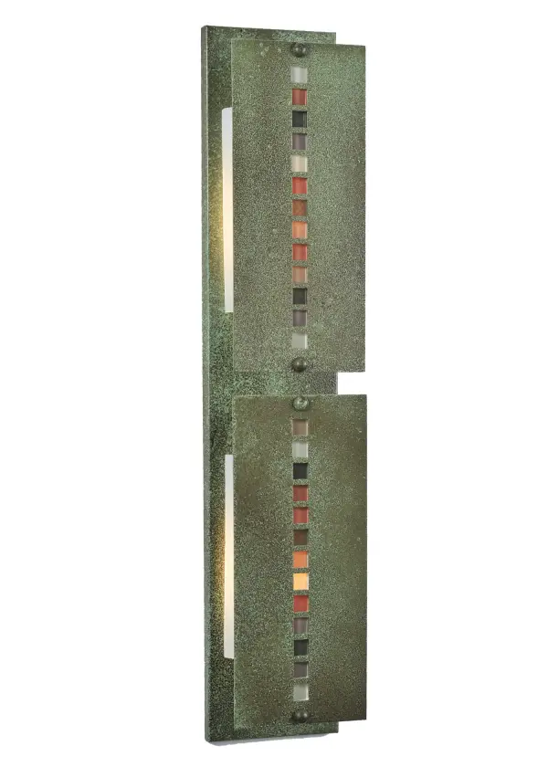 Inspired by naturally weathered stones on the path to a cozy cottage in the woods, Customer-supplied glass tiles are hand-set on the raised side panels of this Arts & Crafts styled wall sconce. Behind the glass tile insets is a layer of Amber Mica to provide a unique decorative ambiance. The linear frame and raised panels are hand-finished in Tarnished Copper to create the signature look of American Bungalow. The fixture can be installed either vertically or horizontally to meet your lighting needs. Featured in the Moss Creek family, it is handcrafted by Meyda artisans in the Yorkville, New York manufacturing facilities. Collection: Moss Creek Finish: Tarnished Copper Glass: Autumn Width: 30.00" Height: 6.00" Length: 4.00" Weight: 8.50 lb Extension from Wall: 4.00" Number of Bulbs: 2 Maximum Wattage: 60.00 W Bulb Type: T10 Bulb Base: E26 Material: Steel Country of Origin: USA Safety Listing: Dry Safety Rating: Dry