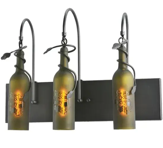 Invite the unique look and elegance of Wine Bottle lighting into any restaurant; club or home. This fixtures features wine bottles that were personalized with the name of the customer on the bottles. Three Wine Bottles delicately etched on Frosted Green glass are embraced by graceful arms and complemented with delicate metal grape leaf and vine accents in Black. The hardware is also hand finished in Black. Use this fixture as a vanity light to illuminate a bath or light up a hallway or other room as a wall sconce. Handcrafted in the USA by our artisans; the fixture is offered in custom styles; colors and sizes. Energy efficient lamping options are offered. UL and cUL listed for dry and damp locations.