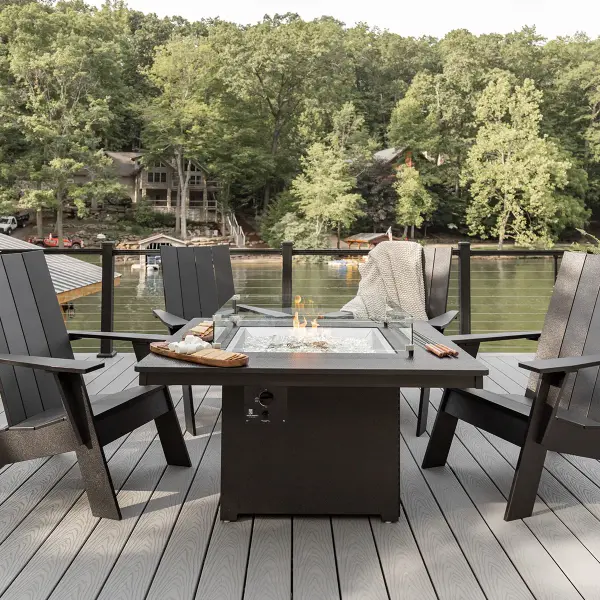 The Nordic Adirondack Chair combines classic outdoor comfort with contemporary design. Crafted from Marine Grade Poly, it offers exceptional durability and weather resistance without the maintenance demands of traditional wood furniture. - alternate view