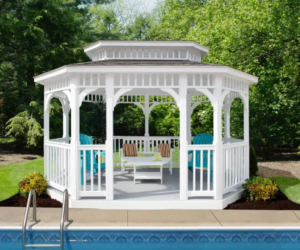 Experience the perfect fusion of style and function with Berlin Gardens' Vinyl Oblong Gazebo. Meticulously crafted for enduring beauty and spacious comfort, this gazebo creates a captivating outdoor sanctuary, providing an ideal setting for gatherings and moments of tranquility in your backyard oasis. Standard Model Includes: • White vinyl exterior • Classic roof • American style rail • Metal or asphalt shingles - alternate view