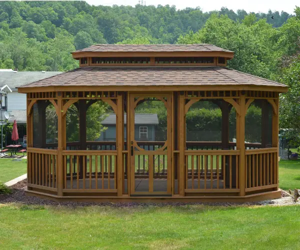 Experience the perfect fusion of style and function with Berlin Gardens' Wood Oblong Gazebo. Meticulously crafted for enduring beauty and spacious comfort, this gazebo creates a captivating outdoor sanctuary, providing an ideal setting for gatherings and moments of tranquility in your backyard oasis. Standard Model Includes: • Classic roof • American style rail • Metal or asphalt shingles