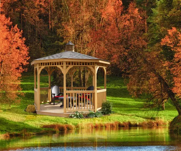 Embrace the warmth of natural aesthetics with Berlin Gardens' Wood Octagon Gazebo, where classic design meets enduring craftsmanship. This thoughtfully crafted structure adds a touch of rustic charm to your outdoor space, creating an inviting haven for gatherings and moments of serenity beneath the open sky. Standard Model Includes: • Regular roof • American style rail • Metal or asphalt shingles • Cupola