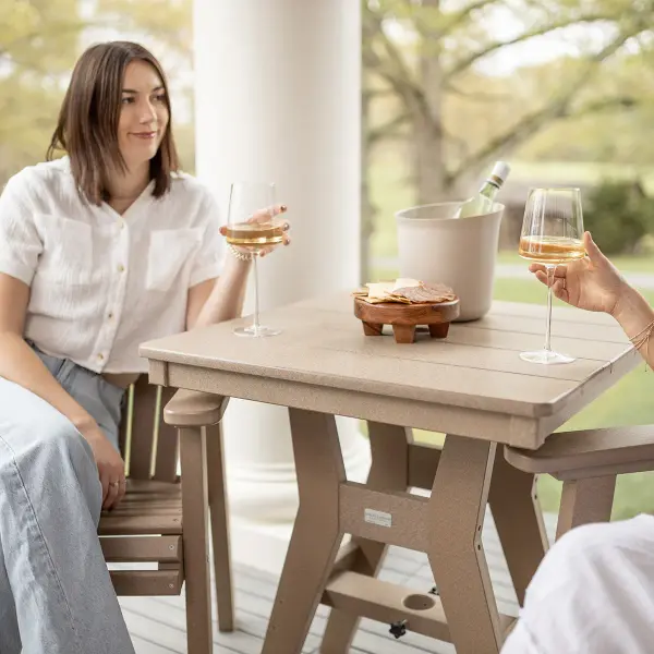 Gather around a Harbor table and experience outdoor dining at its finest. Dimensions: 28"Square x 30⅜"H Available in dining, counter, and bar height (shown in dining height) Counter: 28"Square x 35⅝"H Bar: 28"Square x 38⅞"H - alternate view
