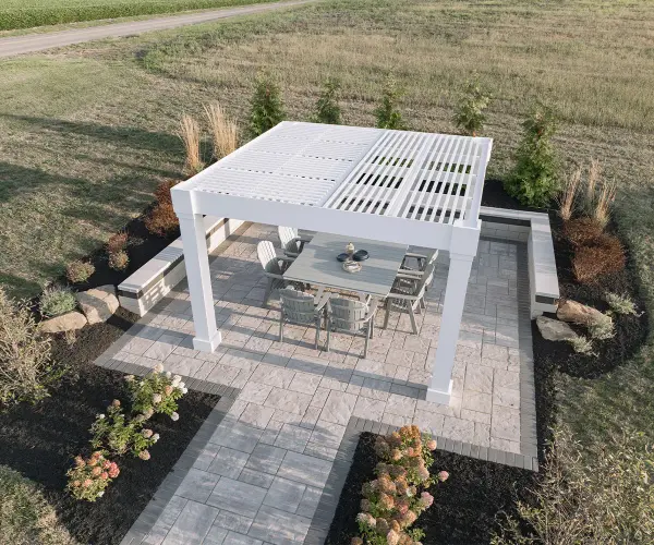 Unveil the allure of outdoor luxury with the low maintenance Porter, an embodiment of timeless charm and architectural excellence. Crafted with precision and designed for enduring beauty, this pergola transforms your space into a picturesque vineyard-inspired haven, perfect for creating cherished moments under the open sky. Standard Model Includes: • Pressure treated wood wrapped with cellular PVC • Paintable • 8×8 posts • Modern checkered top design - alternate view
