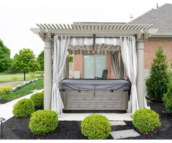 Elevate your outdoor space with our Urbana, a captivating blend of contemporary design and enduring craftsmanship. Immerse yourself in stylish sophistication as you transform your backyard into a haven of relaxation and entertainment. Standard Model Includes: • White vinyl • 6" X 6" posts • Scrolled or classic end caps • Pressure treated wood inserts in posts, beams, and purlins - alternate view