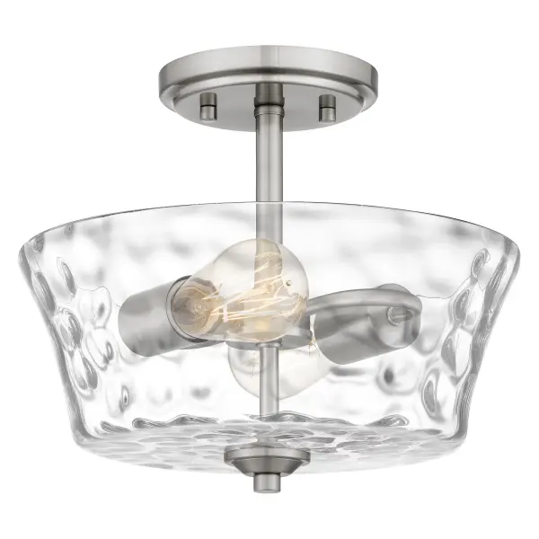 Dappled clear water glass creates a serene sense of movement in the Acacia series. Available in brushed nickel or matte black, Acacia adds subtle sculptural appeal to any room in the house. Choose from a mini pendant, chandelier, island light, semi-flush mount, flush mount, bath light, or wall sconce.