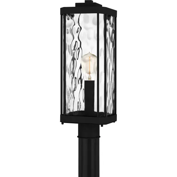 Clear hammered glass adds major visual intrigue in the Balchier lantern collection. The coastal-inspired frame is crafted from steel and finished in a classic matte black, creating a look that is both on-trend and durable. Install Balchier by itself or flank a front door with a lantern on either side to create instant, welcoming illumination for your guests. Balchier is also available as a post or hanging lantern.