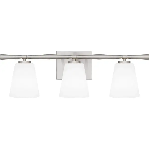 With geometric lines and a slim silhouette, Brindley bath lights draw inspiration from mid-century design. Opal etched glass shades soften the light, creating a warm spa-like glow. Brindley is available in multiple size options and your choice of brushed nickel or aged brass - choose the finish that best suits your distinctive style. Collection: Brindley Rooms: Bathroom Finish: Brushed Nickel Glass: Opal Etched Glass Width: 23.50" Height: 7.25" Length: 5.75" Weight: 4.18 lb Extension from Wall: 5.75" Wire: 6" Canopy: 6.000"x4.750" Number of Bulbs: 3 Maximum Wattage: 100.00 W Bulb Type: A19 Bulb Base: Medium Dimmable Voltage: 120.00 V Material: Steel Safety Listing: ETL Spec Sheet Instructions