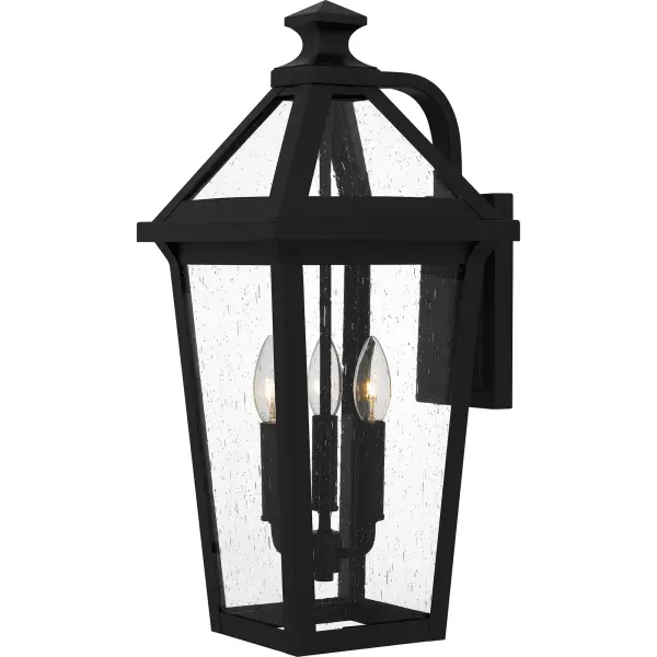 Clear seedy glass adds visual intrigue in the Boulevard outdoor lantern collection. The traditional style frame is crafted from steel and finished in a classic matte black, creating a look that is both on-trend and durable for outdoor use. Install the wall lights alone or flank a front door with a lantern on either side to create instant, welcoming illumination for your guests. Boulevard is also available as a post light or hanging lantern.