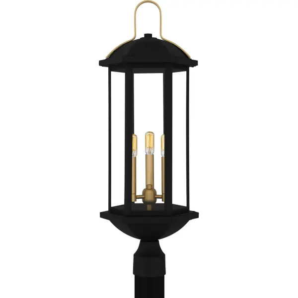 The Crestfield post lantern combines matte black with brushed gold accents for sophisticated outdoor lighting. Clear glass panels showcase the light beautifully while coastal-grade aluminum ensures durability in harsh weather conditions.