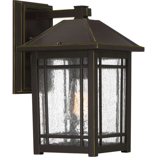 From a rustic lodge to a craftsman-style cottage, the Cedar Point collection is versatile styling at its finest. The seedy glass panels subtly obscure the light source while providing visual interest. The frame is accented with slender trim and lattice detailing that beautifully frames the lantern’s soft glow. A rich Palladian bronze finish completes the look.