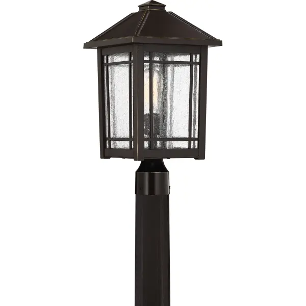 From a rustic lodge to a craftsman-style cottage, the Cedar Point collection is versatile styling at its finest. The seedy glass panels subtly obscure the light source while providing visual interest. The frame is accented with slender trim and lattice detailing that beautifully frames the lantern’s soft glow. A rich Palladian bronze finish completes the look.
