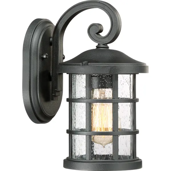 Inspired by Craftsman design, the Crusade Outdoor Series is clean and classic.  Encased in the crisscrossed bands, the clear seedy glass emits plenty of light.  The fixture body is created using a composite material suitable for extreme temperatures and is resistant to fading.  It is a wonderful addition to the Coastal Armour Collection.  Available in Mystic Black and Palladian Bronze finishes.  (Please note that the vintage bulbs are not included but are available for purchase.)