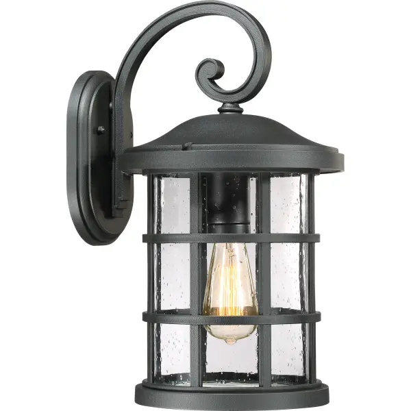 Inspired by Craftsman design, the Crusade Outdoor Series is clean and classic.  Encased in the crisscrossed bands, the clear seedy glass emits plenty of light.  The fixture body is created using a composite material suitable for extreme temperatures and is resistant to fading.  It is a wonderful addition to the Coastal Armour Collection.  Available in Mystic Black and Palladian Bronze finishes.  (Please note that the vintage bulbs are not included but are available for purchase.)