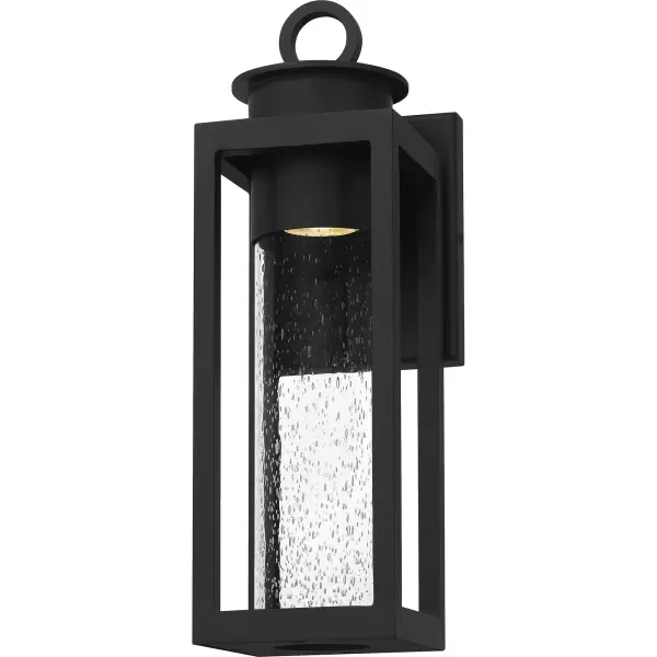 Donegal's classic silhouette features an updated design that combines traditional style with industrial elements. A clear seeded glass cylinder surrounds the wall lantern's light source and directs the light for ideal ambient light. A durable Matte Black finish completes the look and makes for an easy addition to the outside of your home.