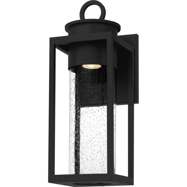 Donegal's classic silhouette features an updated design that combines traditional style with industrial elements. A clear seeded glass cylinder surrounds the wall lantern's light source and directs the light for ideal ambient light. A durable Matte Black finish completes the look and makes for an easy addition to the outside of your home.