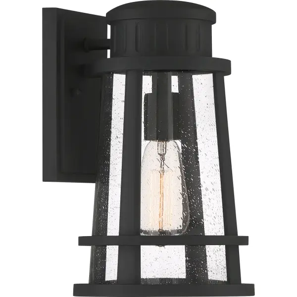 Illuminate your home's exterior with the Dunham collection. The classic lighthouse silhouette is crafted from a sturdy composite and finished in Earth Black and paired with clear seedy glass. As a part of our Coastal Armour collection, you can rest assured that this fixture is built to last.