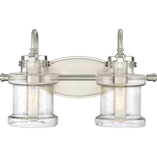 Traditional in design yet transitional in execution, the Danbury collection features globes in seedy glass with a unique jar-like silhouette. The decoratively capped center rod supports gooseneck arms that secure the vintage-inspired globes with exposed latches. The versatility of the collection is further defined by its lustrous Polished Chrome, Brushed Nickel, or Earth Black finish.