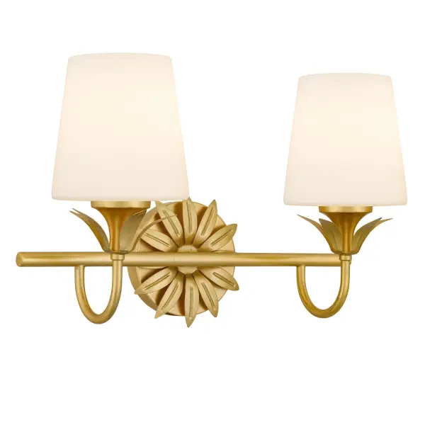 Elegant and enchanting, the Dorothea light is a radiant ode to classic beauty. Whether styled as a wall sconce or a vanity light, its design captivates with a graceful gold leaf finish and soft, sculptural detailing reminiscent of blooming petals. The opal etched glass shades diffuse light with a gentle glow—like morning sunlight filtering through fine linen. Available in multiple sizes, Dorothea brings a romantic warmth and timeless sophistication to any space, illuminating your home with poise and charm.