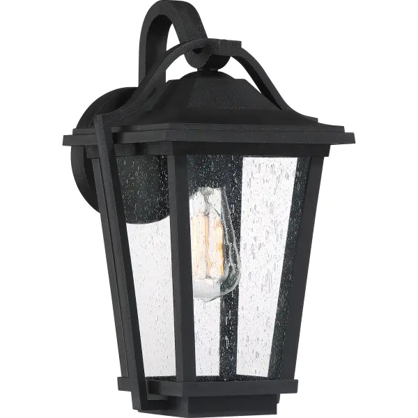 Let Darius light your way home. This collection of post and wall lanterns provides ample, failsafe lighting with the refinement and texture of clear seedy glass. Rendered in resin, Darius will never rust or corrode and is stain-resistant. The earth black finish grounds the look — simple, sophisticated, and designed with functionality first and foremost in mind.