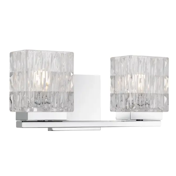 Glimmering like a jewel at dusk, the Estelle Vanity Light brings refined romance to any space. Its crystal glass shades catch the light with dazzling brilliance, casting a delicate sparkle reminiscent of candlelight dancing across fine crystal. Framed in a sleek polished chrome finish, Estelle feels both modern and timeless—elegance reimagined. Available in multiple sizes, it’s a radiant companion for morning rituals and moonlit evenings alike, wrapping every moment in luminous beauty.