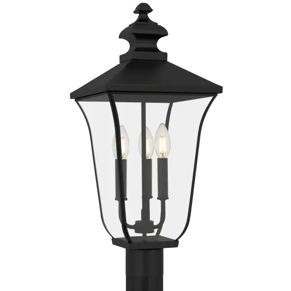 Gracefully bridging the charm of old-world elegance with modern sophistication, Farley Outdoor Lanterns cast a warm, inviting glow that turns every evening into a moment worth savoring. With a matte black finish and crystal-clear glass panels, each lantern showcases delicate details and a silhouette reminiscent of historic carriage lanterns — perfect for creating a nostalgic ambiance on your porch, patio, or garden path. Customize your look with included candle sets in matte black or white for a charming, candlelit ambiance.