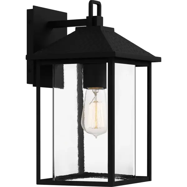 Fletcher's classic silhouette boasts a sleek design that combines transitional style with industrial elements. This collection of post, hanging, and wall lanterns provides ample, ambient lighting with the refinement of clear glass. An earth black frame completes the look, featuring a uniquely textured pattern for added style. As part of our Coastal Armour collection, this product is durable, marine grade, and comes with a 5-year limited warranty.