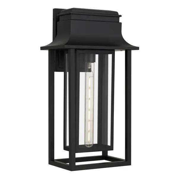 Sleek, structured, and quietly captivating, the Garner Outdoor Wall Lantern is where modern simplicity meets timeless romance. Its bold matte black finish and clear glass panels frame your light with intention—offering a soft, welcoming glow that turns every entrance into an elegant arrival. With its clean lines and architectural silhouette, Garner brings a sense of calm sophistication to your outdoor spaces, inviting the evening to linger just a little longer.