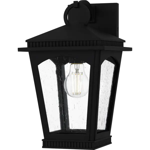 The Huck outdoor lantern collection offers a traditional design with a twist, perfect for sleek exteriors. The tapered frame is finished in a sophisticated earth black finish and features unique ribbed detailing along the top that adds visual interest. Clear seedy glass panels complete the look and allow the natural beauty of the bulb to shine through,  providing a warm and inviting glow. Huck is available in a complete collection, allowing you to create a cohesive look for your entire outdoor space.
