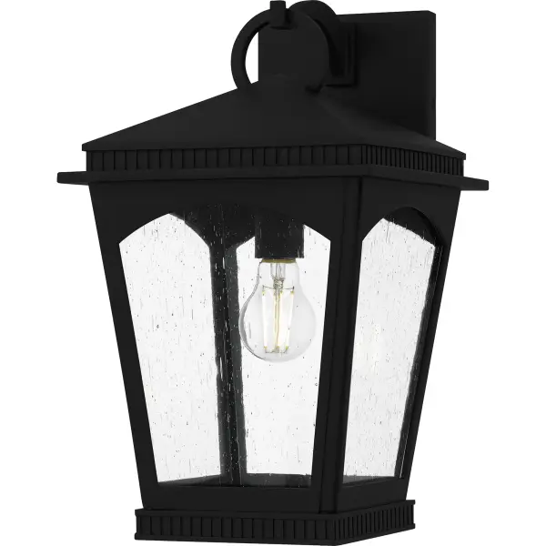 The Huck outdoor lantern collection offers a traditional design with a twist, perfect for sleek exteriors. The tapered frame is finished in a sophisticated earth black finish and features unique ribbed detailing along the top that adds visual interest. Clear seedy glass panels complete the look and allow the natural beauty of the bulb to shine through,  providing a warm and inviting glow. Huck is available in a complete collection, allowing you to create a cohesive look for your entire outdoor space.