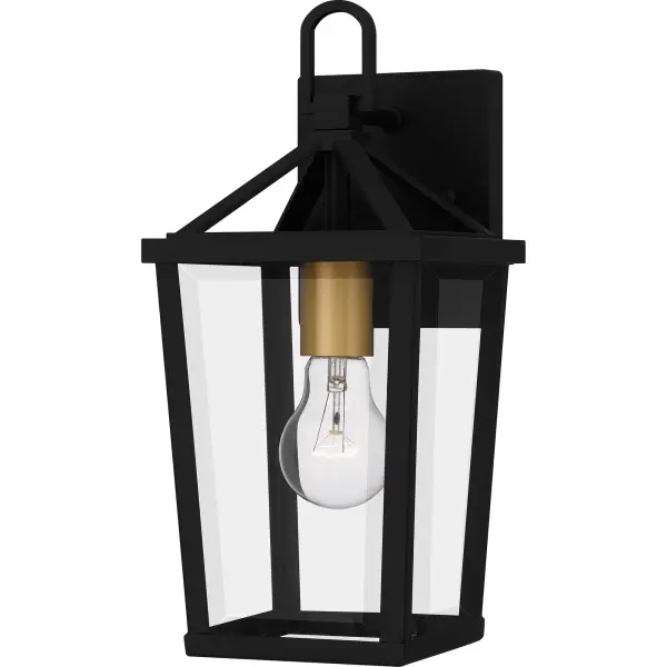Hull is a traditional outdoor lantern collection designed for sleek exteriors. The tapered frame is finished in matte black and accented beautifully with gold candle sleeves for a hint of luster and industrial style. Clear beveled glass panels complete the look and showcase the natural beauty of the light. Hull is available as a complete collection - round out your home's exterior with a hanging lantern, wall lanterns, or a post lantern.