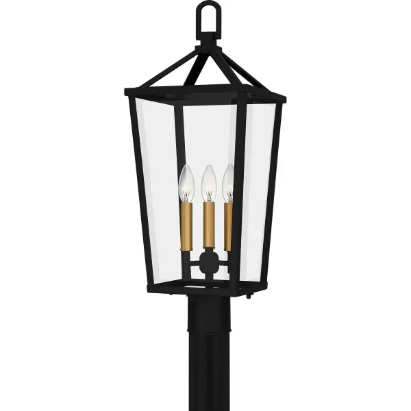 The Hull post mount combines traditional lantern styling with modern industrial touches. The matte black finish and gold candle sleeves create visual interest, while clear beveled glass panels showcase the light beautifully.