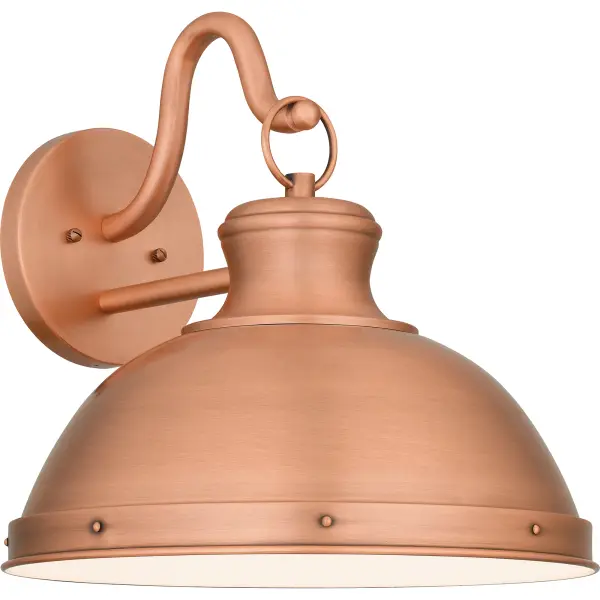Reminisce with Jameson, an outdoor wall lantern crafted from solid copper. A stunning aged copper finish is highlighted by a rounded hook design and small grommet details, lending a hint of industrial charm to the romantic dome-shaped silhouette. While designed primarily for outdoor use, Jameson can also be used inside the home as a wall sconce or above a bathroom mirror.