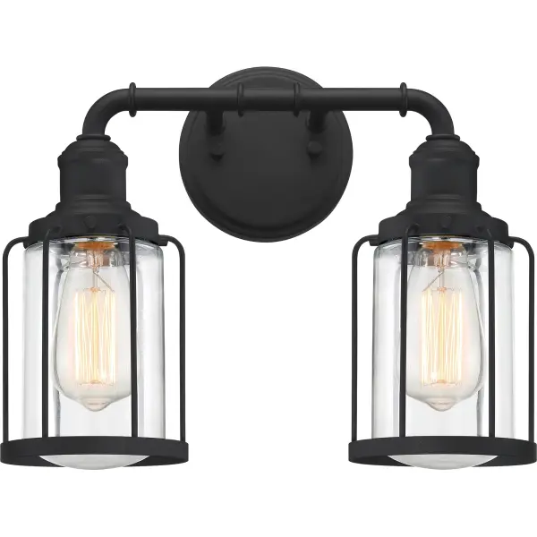 Add an industrial feel to your home with the Ludlow collection. A simple silhouette combined with caged glass shades creates interest without sacrificing light projection. Finished in earth black, this collection is the perfect addition to any room.
