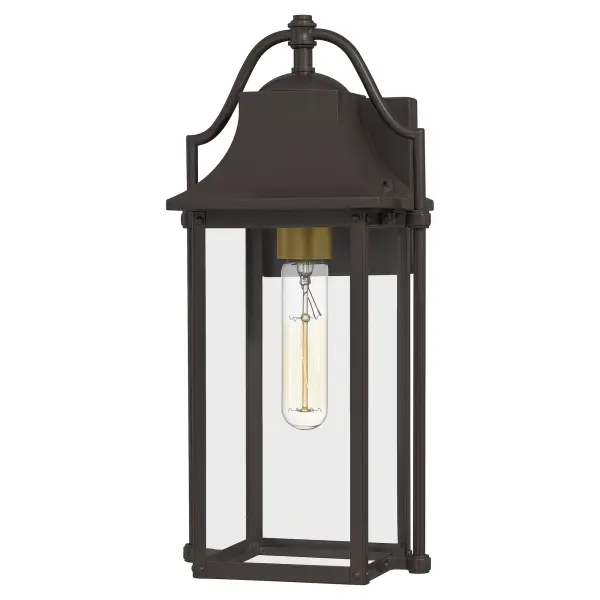 Bring a welcoming glow to your home's entrance with the Manning collection. This traditional style lantern is finished in Western Bronze and gives off an old gaslight feel. The clear glass panels allow for an unobstructed view of the light's interior which features  Weathered Brass candsleeves for a unique, dual-tone look.