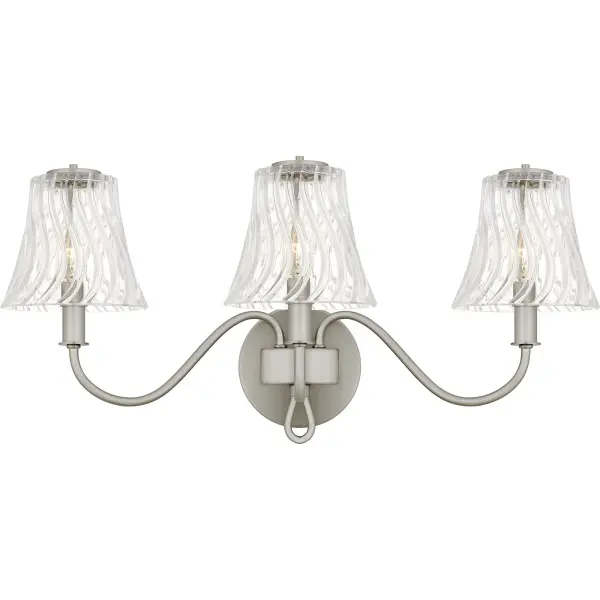 With its traditional styling and clean lines, McKinney is a perfect addition to any bathroom vanity setting. Choose from a brushed nickel finish with clear swirl glass or a matte black finish with etched swirl glass. The glass shades feature a fun twist design, adding a touch of texture and creating a captivating focal point. McKinney is available in multiple size options, allowing you to elevate any bathroom space with ease.