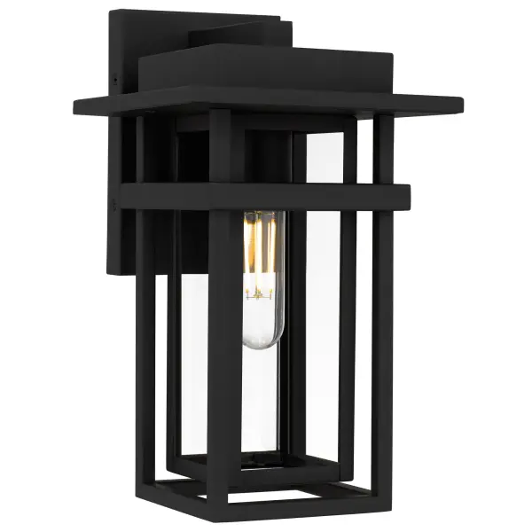 With a silhouette that evokes quiet evenings and glowing pathways, the Morgan Outdoor Lantern casts more than just light—it creates atmosphere. Finished in a rich earth black, its architectural lines feel grounded and confident, while the clear beveled glass panels add a touch of refined sparkle, catching the light like dewdrops at dusk. Whether flanking an entryway or illuminating a garden path, Morgan radiates warmth and welcome—inviting guests in with a golden glow and whispering stories of home under a canopy of stars.