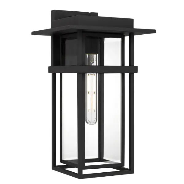 With a silhouette that evokes quiet evenings and glowing pathways, the Morgan Outdoor Lantern casts more than just light—it creates atmosphere. Finished in a rich earth black, its architectural lines feel grounded and confident, while the clear beveled glass panels add a touch of refined sparkle, catching the light like dewdrops at dusk. Whether flanking an entryway or illuminating a garden path, Morgan radiates warmth and welcome—inviting guests in with a golden glow and whispering stories of home under a canopy of stars.