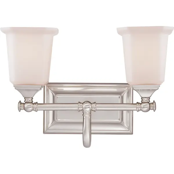 This gleaming collection gives a solid nod to mid century style. The squared shape of the opal etched glass shades gives this design an edge  and it is complemented beautifully by the rectangular backplate.All Nicholas bath fixtures can be mounted as uplights or downlights and are available in several sizes.