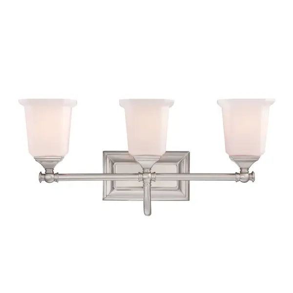 This gleaming collection gives a solid nod to mid century style. The squared shape of the opal etched glass shades gives this design an edge and it is complemented beautifully by the rectangular backplate. Collection: Nicholas Rooms: Bathroom Finish: Brushed Nickel Glass: Opal Etched Glass Width: 21.75" Height: 10.00" Length: 7.00" Weight: 5.70 lb Extension from Wall: 7.00" Wire: 6" Canopy: 8.000"x4.500" Number of Bulbs: 3 Maximum Wattage: 100.00 W Bulb Type: A-19 Bulb Base: Medium Voltage: 120.00 V Material: Steel Safety Listing: ETL Safety Rating: ETL Switch: None Manufacturer Warranty: Product Warranty: Limited Warranty Spec Sheet Instructions Parts Diagram